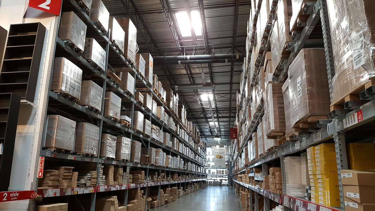 Warehouse aisle with stocked shelves and a smooth floor