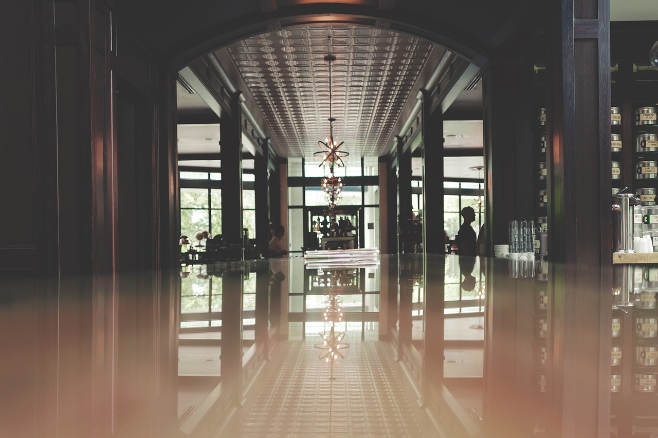 Long hallway with a glossy, reflective floor